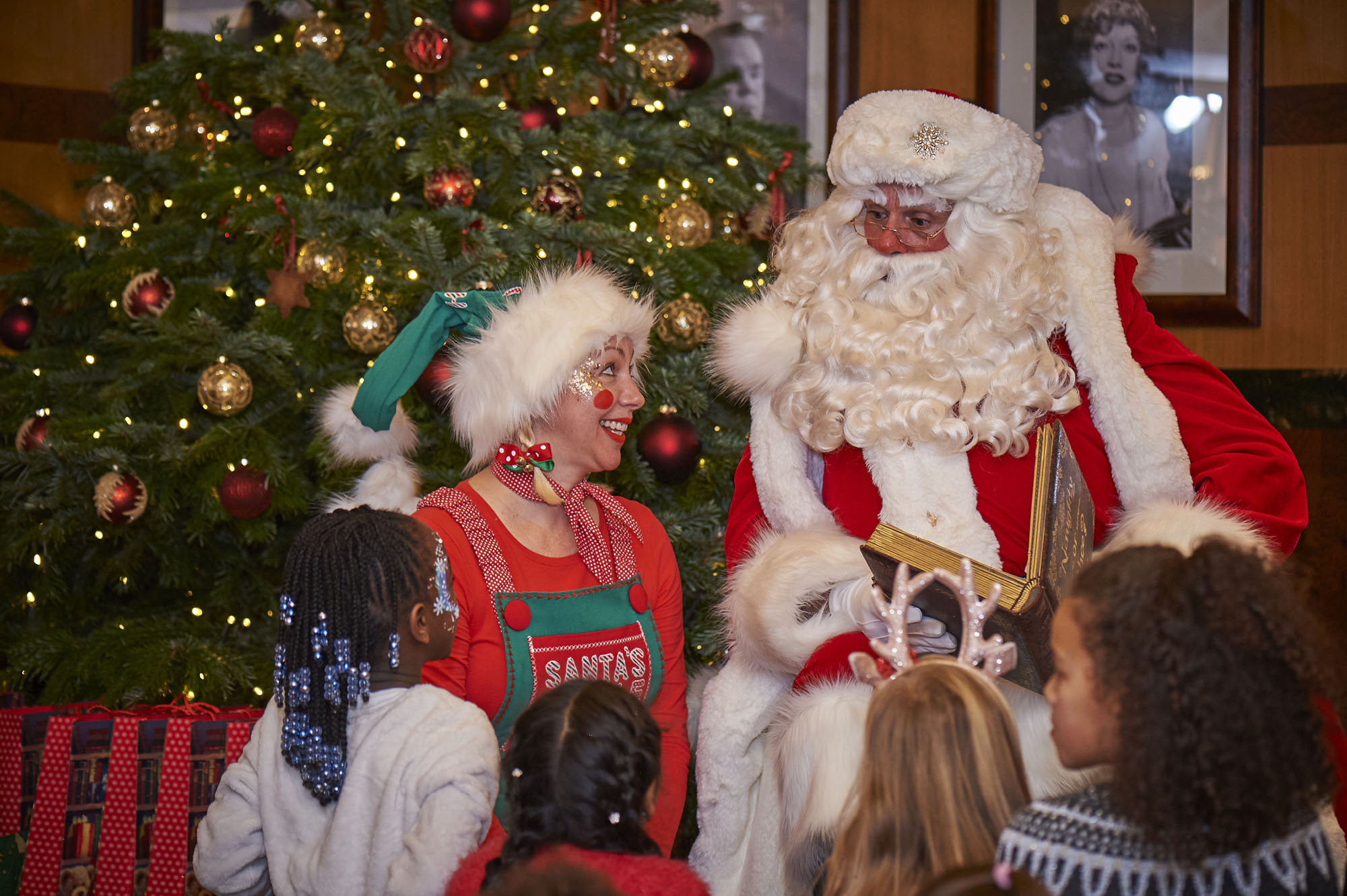 Santa visiting a family at home